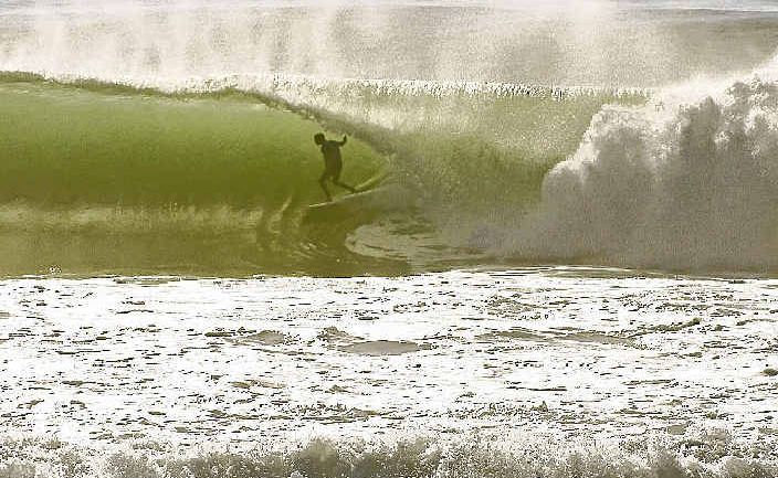 KING KELLY: Kelly Slater in action early one morning at Burleigh Heads. KING KELLY: Kelly Slater in action early one morning at Burleigh Heads.